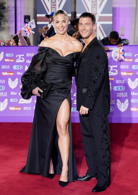 Gorka Marquez and Gemma Atkinson smiling on a red carpet.