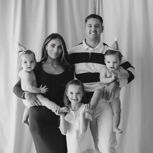 Black and white photo of a family of five.
