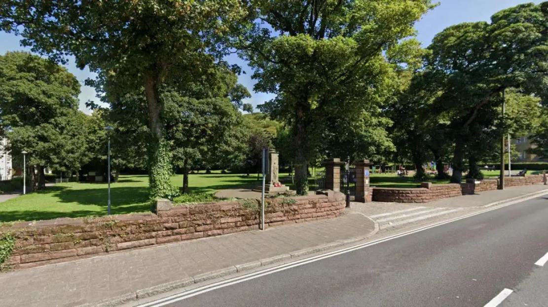 Park with war memorial.