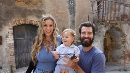 Family portrait in front of an Italian building.