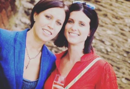 Two women smiling for a photo.