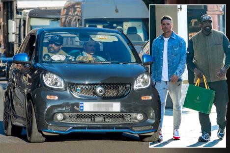 Jermaine Jenas squeezes into boxer pal Derek Chisora’s tiny Smart car as pair hit luxury stores on shopping trip