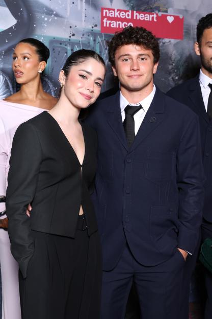 Madalena Aragão and João Neves smiling at the Paris Saint-Germain Foundation Gala.