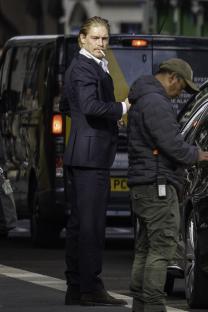 Hugh Bonneville filming a movie scene.
