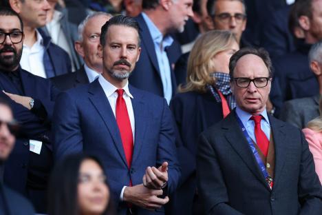 Josh Kroenke and Tim Lewis at a UEFA Champions League semi-final match.