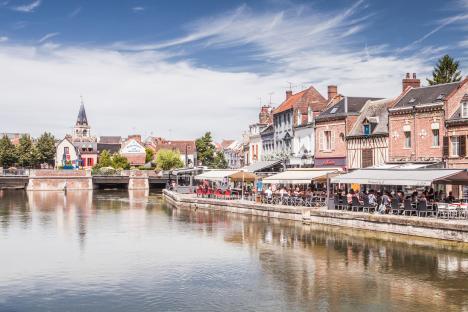 Shops and houses along a canal in Saint Leu, Amiens.