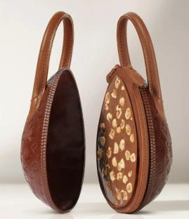 Chocolate egg-shaped handbags filled with hazelnuts.