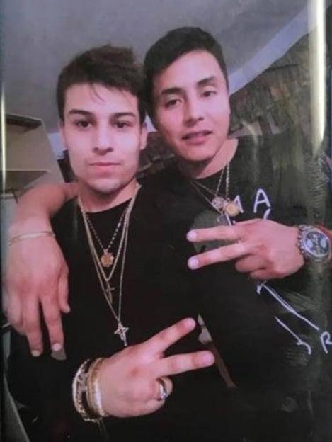 Photo of Danko Carvajal-Donaire and Nicolas Portilla Astorga wearing stolen jewelry.