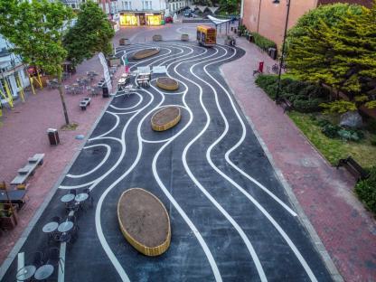 A newly pedestrianised zone has been branded a waste of money with a silly design at a huge cost to the taxpayer along Montague Place in Worthing, West Sussex. Wiggly white lines were added to the new tarmac surface which has cost £178,000 as part of an improvement scheme, of which £23,500 was spent on design and management fees and £1,230 on the painting of the swirly white lines. The Worthing Society Committee were dismayed to see the appearance of the swirly white lines and urged the council to remove the harsh, intrusive white lines as soon as practically possible. Writing on Facebook Sue Belton Worthing Society Chair added, This area is part of the historic South Street Conservation Area and should showcase the town linking Montague Street to the seafront promenade. In our opinion these extensive white lines are over-dominant. They detract from the historic character of the listed buildings Previously the road was used as parking for the disabled for a very short walk to the shops. Now tarmacked, the area has allowed cafes and restaurants to have more outdoor seating, along with new wooden planters which are yet to have flowers and shrubs planted. People took to Facebook to give their views, Tamara Murray wrote Huge shame, waste of money and silly design. By taking away the safe disabled parking there it will take away business from Worthing. Andrea Bristow added, It looks like a kid has been let loose with a white line machine! What an absolute mess. Looks tacky and a terrible waste of money wrote another mystified resident. Roy Hammond saw the funny side writing, I think this is very thoughtful of the council. Its an effort towards all the drunks in Worthing to make them think they are walking in straight lines. Following a freedom of information request to Adur & Worthing Council, they responded with the costings, The pedestrianisation of Montague Place has cost £178,000, of which £23,500 was full technical scheme design and management fees. This was fully funded by the high street grants provided by the government to the Borough Council in response to the re-opening of the high street following the lifting of restrictions. The costs of the decorative white lining were £1,230, which included the cost of material and installation. These costs are included in the overall cost envelope above. Please credit: Paul Jacobs/pictureexclusive.com Standard reproduction rates apply, contact Paul Jacobs, Picture Exclusive to arrange payment - 07923 866166, pictureexclusive@gmail.com
