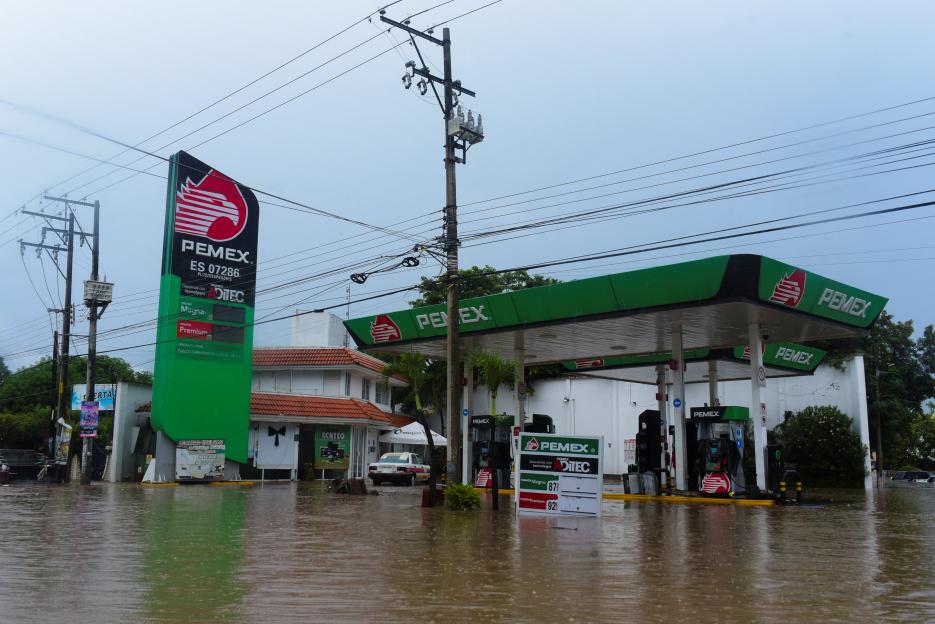 Torrential rains burst rivers, sparking floods in eastern Mexico