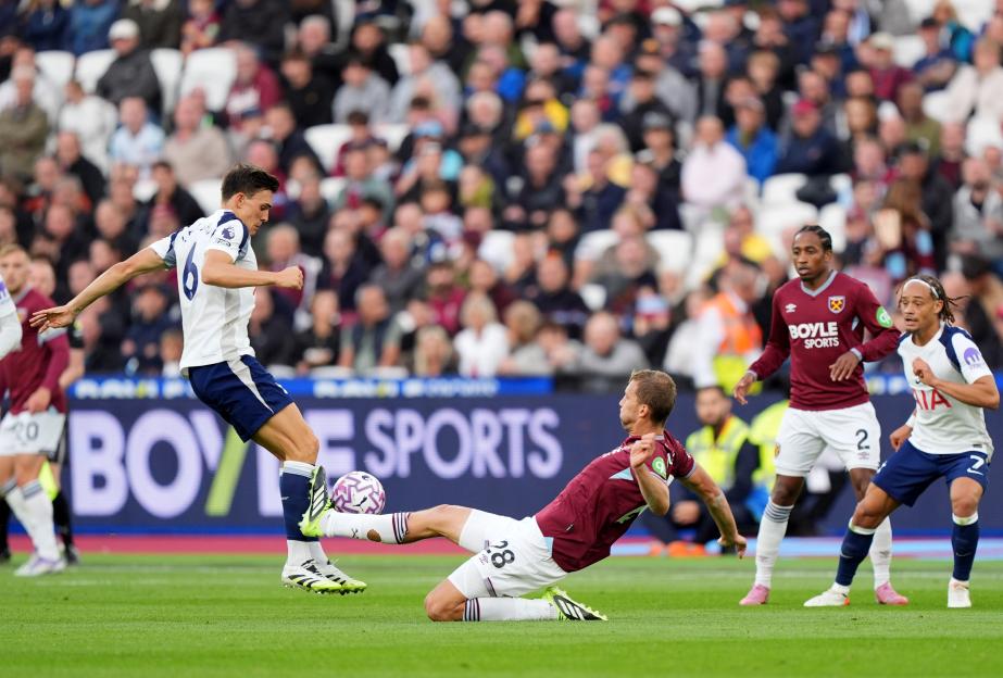 Soccer player fouled during a match.