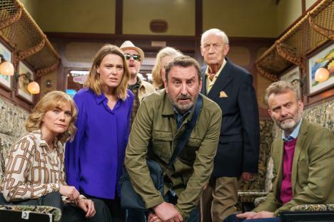 Cast of Not Going Out on a train.
