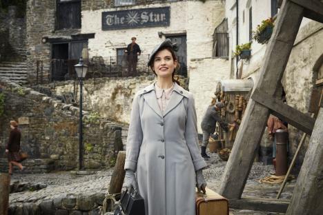 Press image of Lily James in The Guernsey Literary and Potato Peel Pie Society.