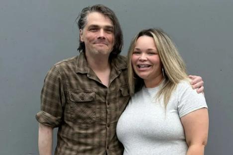 Noughties rock legend looks VERY different as he poses with pregnant YouTube star Trisha Paytas