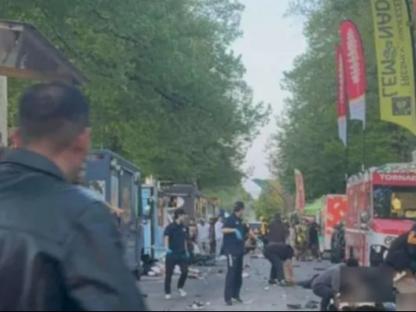 Aftermath of an accident near food trucks.