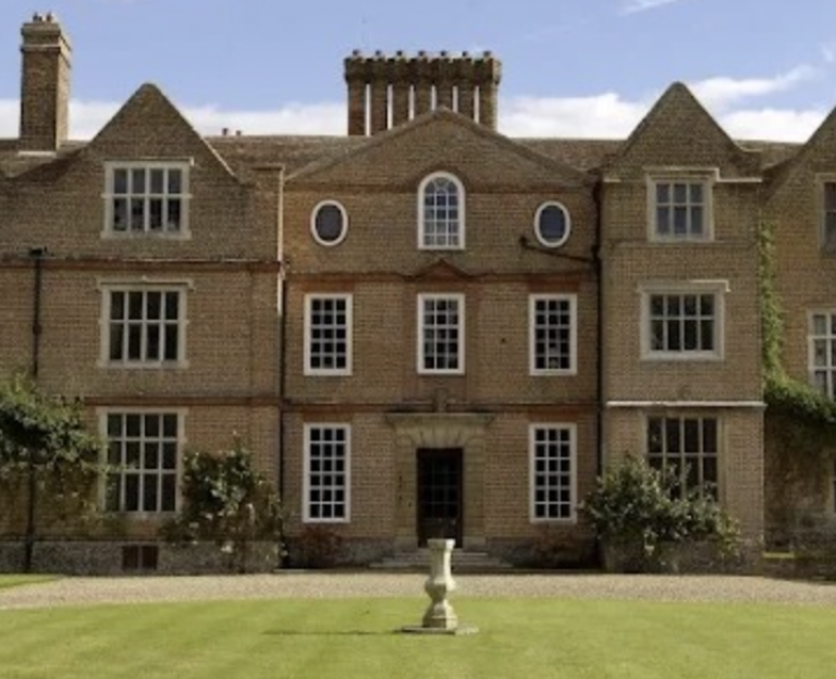 Large brick house in a rivalry contest.