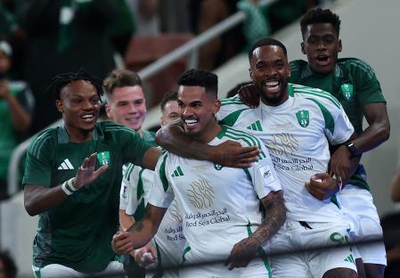 Al-Ahli Saudi players celebrating a goal.