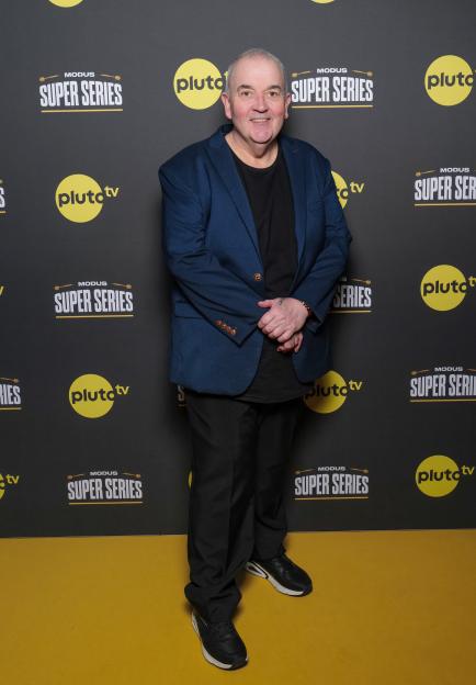 Phil Taylor at a Pluto TV & Modus Super Series darts event.