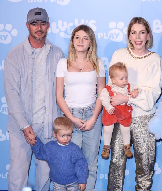 Bobby Kootstra and Katherine Ryan with their children at the Bluey's Big Play Gala Performance.