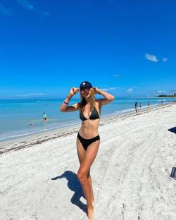 Woman in bikini on a beach.
