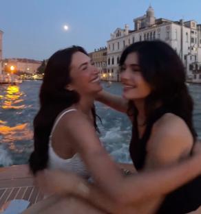 Kylie Jenner and Anastasia Karanikolaou embracing on a boat in Venice.