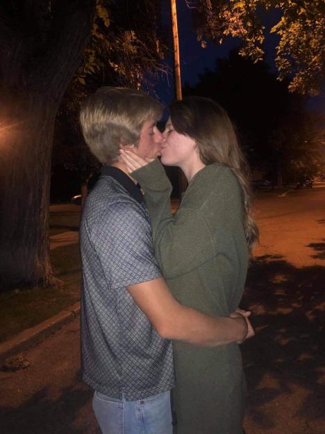 Sabia Reiche kissing Loren Schauers before his accident.