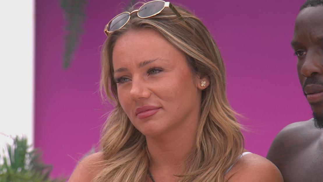 Toni from Love Island looking unsettled.