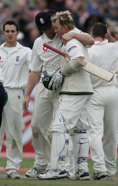 Andrew Flintoff of England and Brett Lee of Australia talking after a drawn cricket match.
