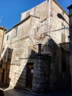 Exterior of a stone house in Mussomeli, Sicily.
