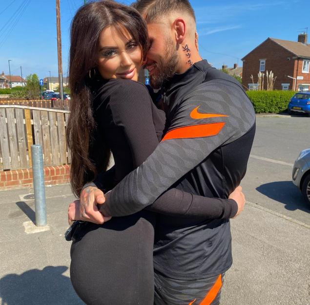 Chloe Ferry and Johnny Wilbo embracing.