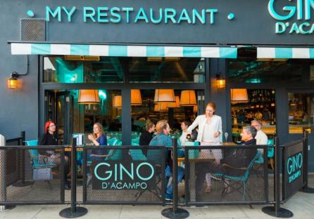 Gino D'Acampo restaurant exterior with patrons dining outside.