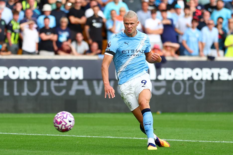 Why are Man City and Man Utd players wearing black armbands?