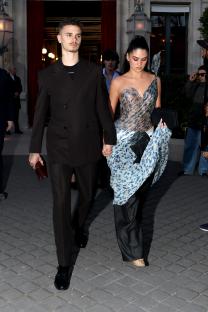 Romeo Beckham and Kim Turnbull at Paris Fashion Week.