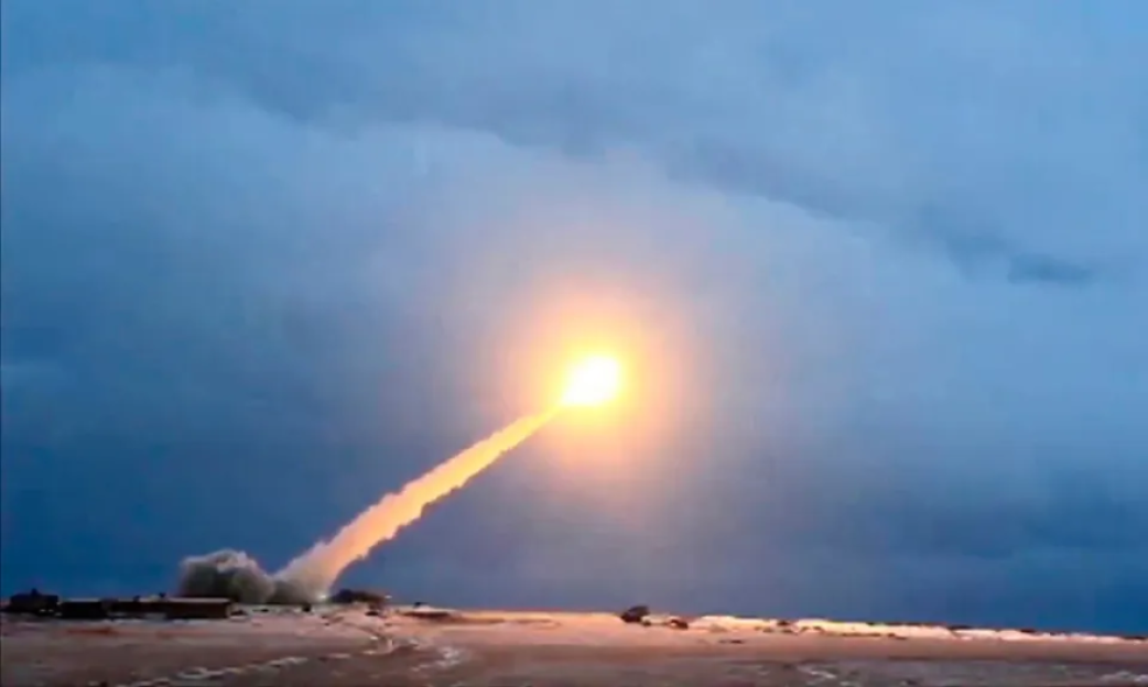 A missile launching from a snowy landscape.