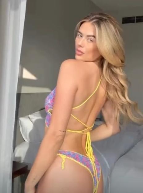 Arabella Chi in a colorful crochet bikini.