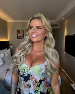 Kerry Katona showing off her weight loss in a floral dress.