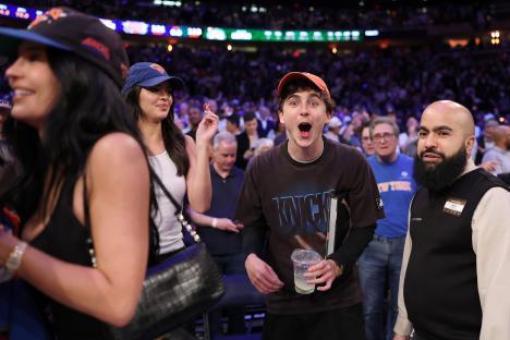 Kendall Jenner, Kylie Jenner, and Timothée Chalamet at an NBA game.