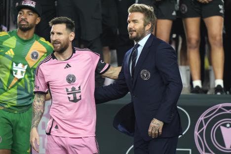 Lionel Messi and David Beckham at an Inter Miami CF ceremony.