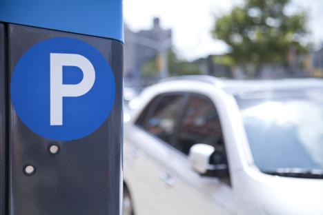 Parking meter with a blue "P" sign.