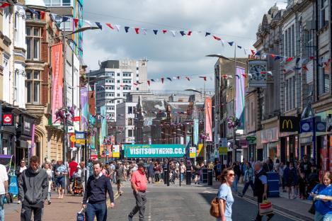 People shopping on a busy High Street in Southend-on-Sea, UK.