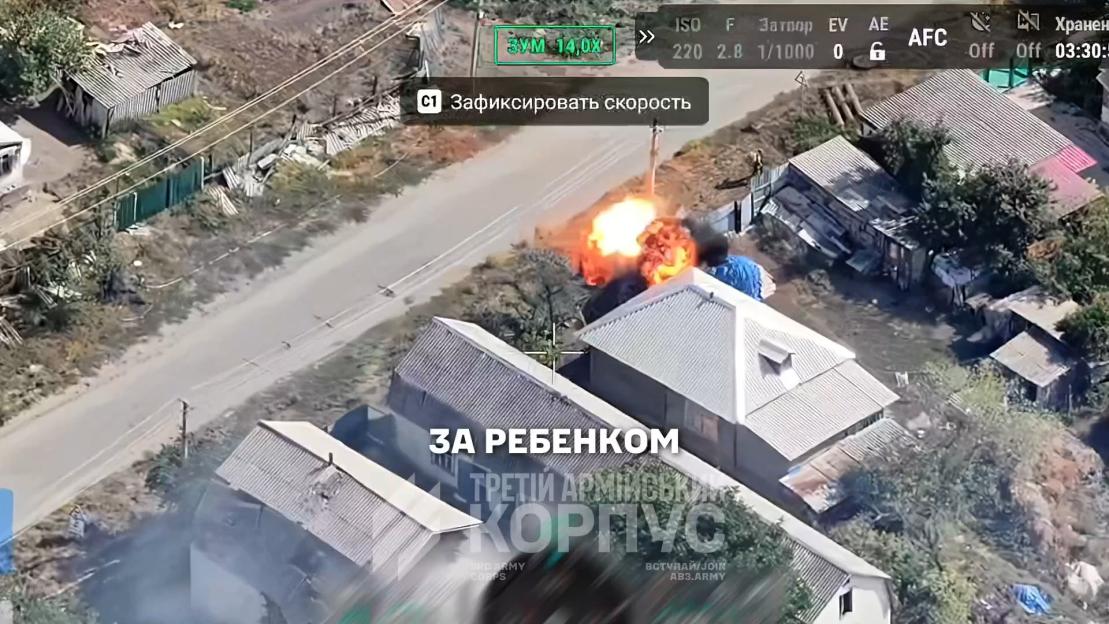 Aerial footage shows an explosion near a house with text overlays.