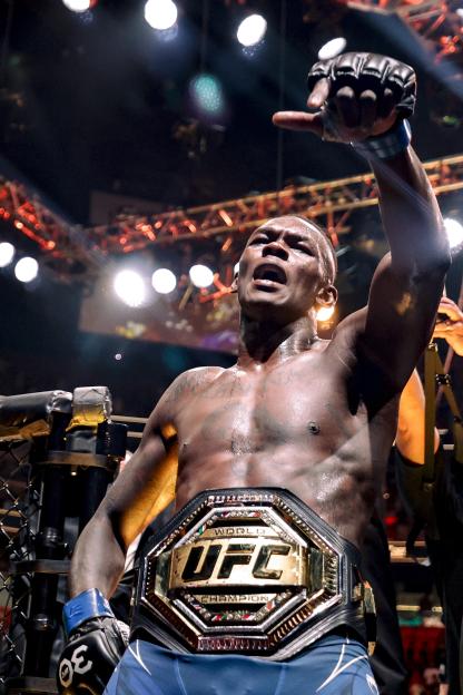 Israel Adesanya of Nigeria celebrates his UFC middleweight victory.