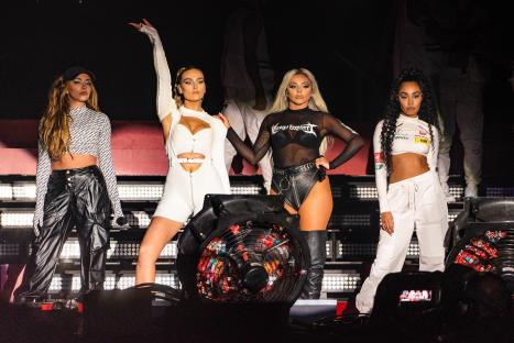 Little Mix performing on stage.