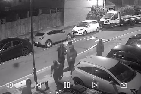 Terrifying moment masked gang lob bricks at mum’s home & smash car windows with MACHETE in chilling dead-of-night raid
