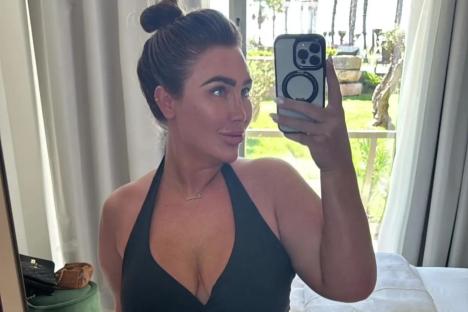 Lauren Goodger shows off her curves in sexy black swimsuit after jetting off to film Towie in Portugal