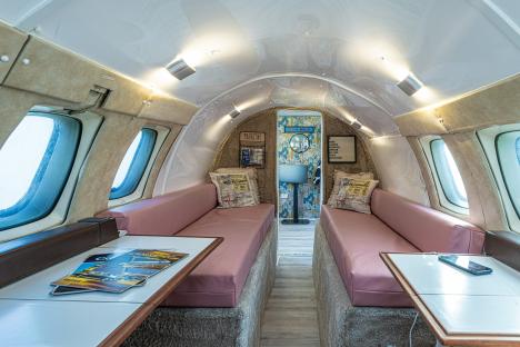 Interior of a converted private jet, now a tiny home.