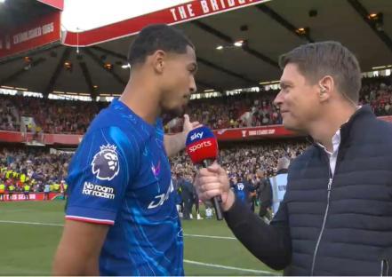 Soccer player being interviewed after a game.