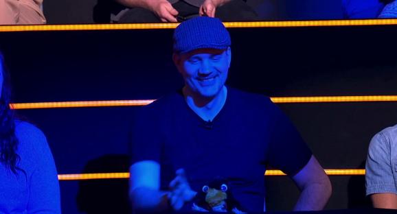 Screenshot of a man on a game show.