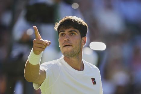 Carlos Alcaraz of Spain reacts at Wimbledon.