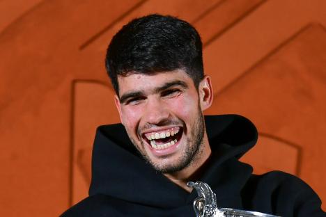 Carlos Alcaraz jets off to Ibiza for holiday with forgotten Premier League star as Wimbledon preparations begin